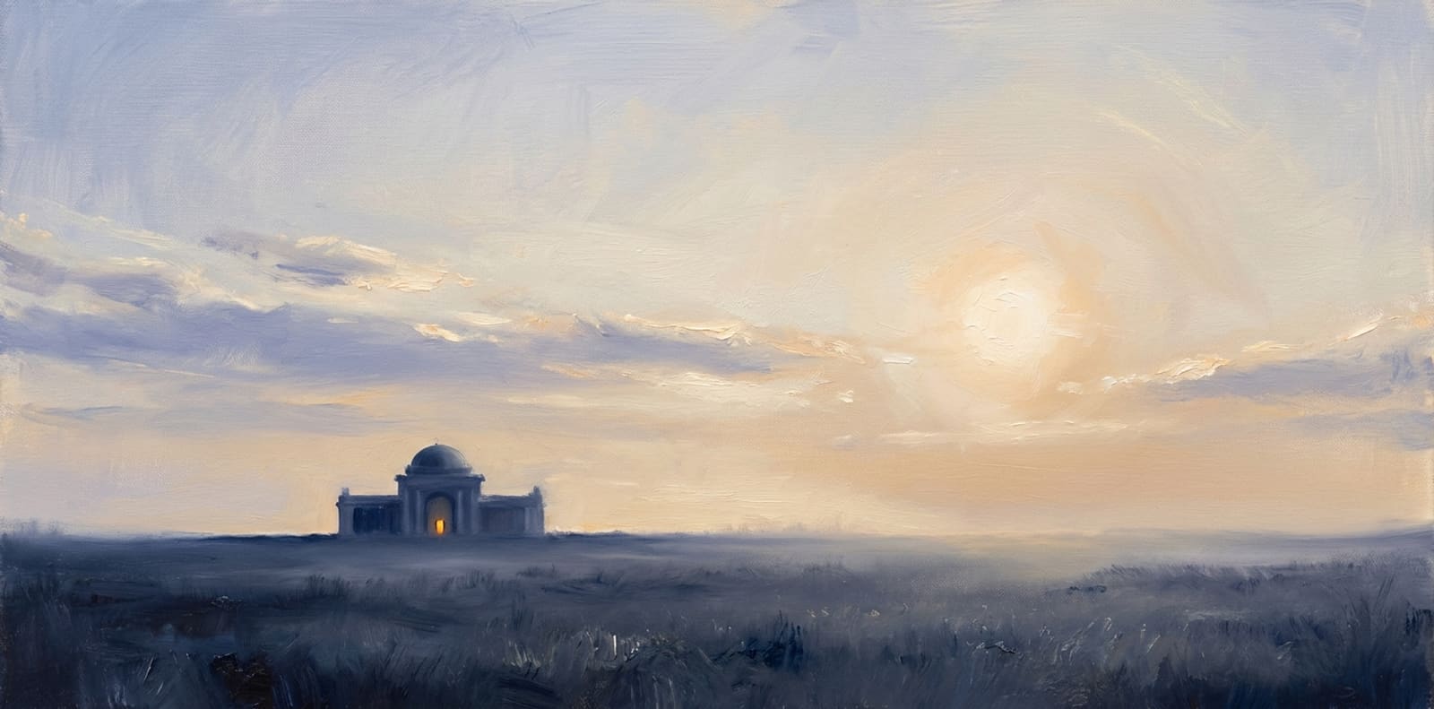 Painterly oil-brushwork composition seen from ground level: indigo brushstroked meadow with grass tufts in the foreground; a low rolling deep-indigo land silhouette at the horizon; vast morning sky in pale indigo, soft peach, and warm cream taking the upper two-thirds of the frame, with a single warm amber rising sun on the right casting rim-light onto the grass. No architecture, no figures, no compass.